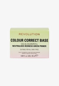 Zielone pudełko z podkładem o gradientowym wzorze przechodzącym od jasnej zieleni do różu. Tekst podkreśla cel: neutralizuje zaczerwienienia, odpowiedni dla wszystkich typów skóry.