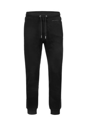 Black sweatpants with an elastic waistband, drawstring closure, side pockets, and ribbed cuffs. Smooth fabric with minimal branding details.