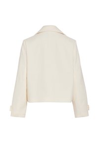 Κοντή μπεζ ζακέτα με γιακά με εγκοπή, μακριά μανίκια και λεπτομέρεια κουμπιών στις μανσέτες. Λείο ύφασμα· μινιμαλιστικός σχεδιασμός χωρίς ορατά μοτίβα.