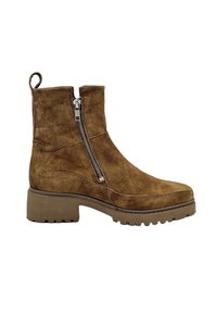 Bruine leren enkelboot met een zijrits, platte rubberen zool en een lus aan de achterkant voor eenvoudig aan- en uittrekken. Beschikt over een gestructureerde afwerking en stevige constructie.