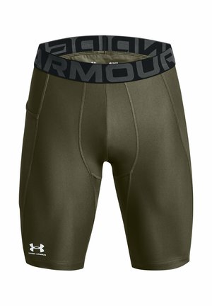 Olivgröna kompressionstights med ett svart Under Armour-midjeband. Har platta sömmar och en åtsittande passform för atletisk prestanda.