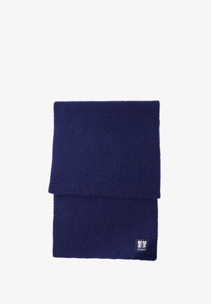 Écharpe en tricot bleu marine avec un motif texturé, présentant un design plié. Petite étiquette logo en bas à droite.