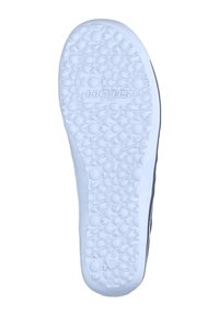 White rubber shoe sole with textured, floral pattern and "Dockers by Gerli" embossed. Edges are rounded; smooth finish overall.