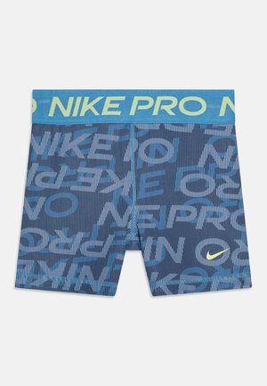 Navy Nike Pro rövidnadrág kék és sárga elastikus derékkal. Átfedő szövegminta, texturált szövet és rövid hossz jellemzi.
