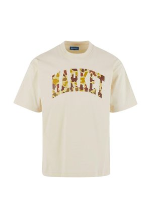 Beige bomulds t-shirt med en buet "MARKET" grafik i camouflagemønster med brune og gule nuancer. Korte ærmer, rund halsudskæring.