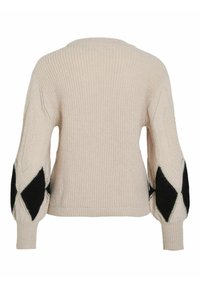 Světle béžový svetr s ribbovanou texturou, černé akcenty v kosočtvercovém vzoru na rukávech a kulatým výstřihem. Nabírané rukávy se zužují u zápěstí.
