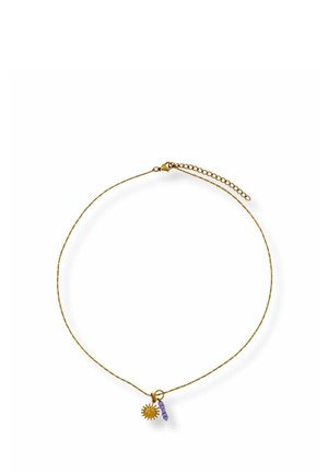 Delicate gold chain necklace with small sun-shaped charm and cluster of five purple beads on white background.