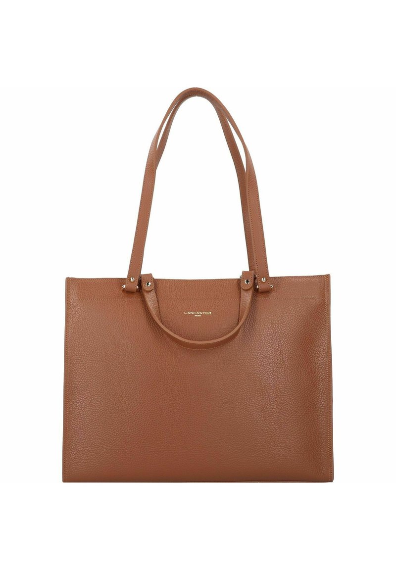 Sac fourre-tout en cuir marron avec une surface texturée, des poignées doubles et un design minimaliste. Présente des détails de logo discrets au centre supérieur.