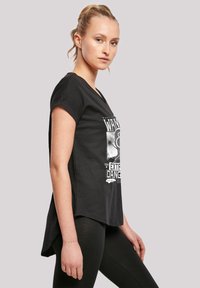 F4NT4STIC PHANTASTISCHE TIERWESEN WANDED AND EXTREMELY DANGEROUS - T-shirts med print - black