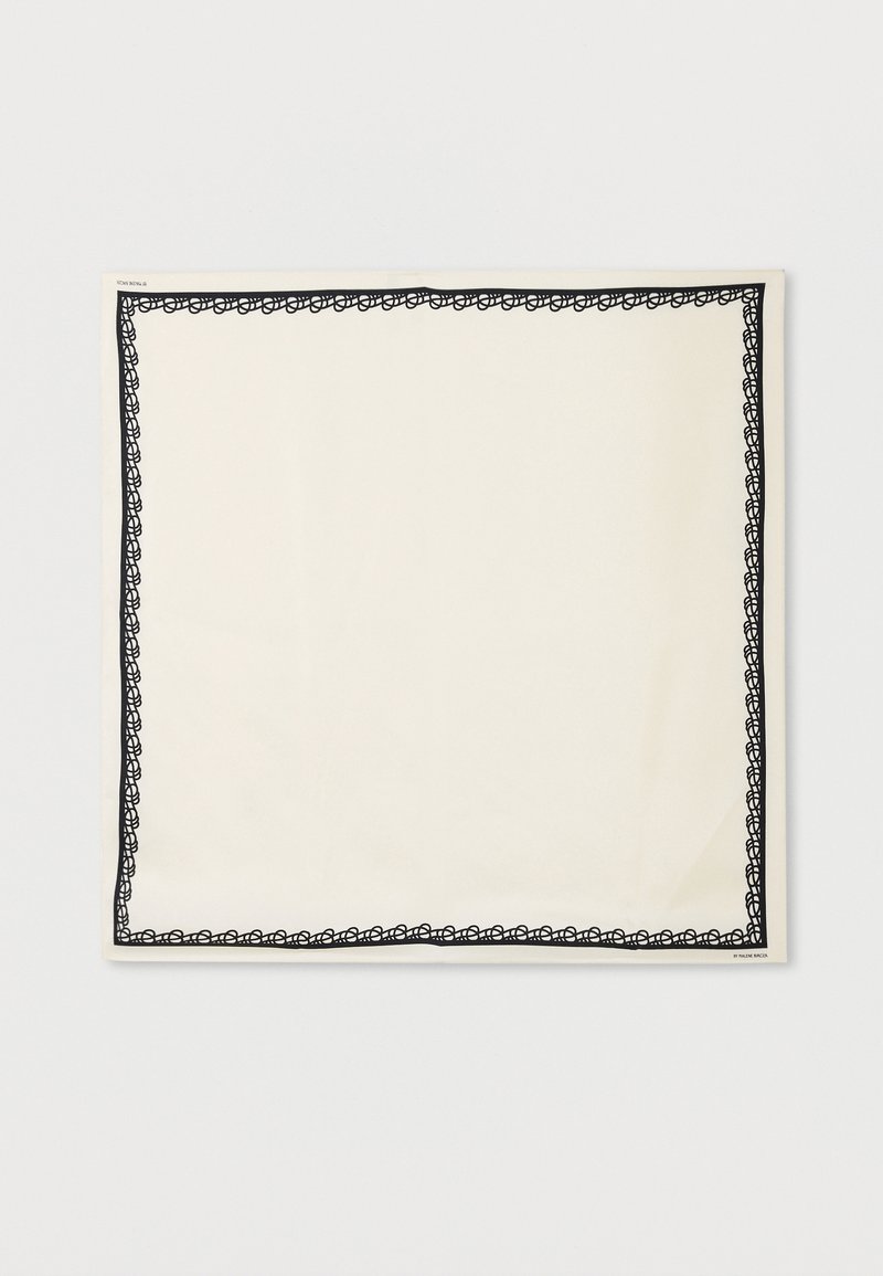 Carré crème avec un motif noir complexe en boucle le long des bords.