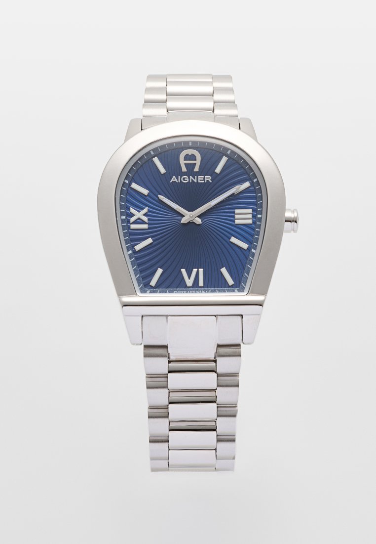 Silberner Edelstahl-Armbanduhr mit blauem strukturiertem Zifferblatt, silbernen Stundenmarkern und einem hexagonalen Gehäusedesign. Verfügt über ein Armband aus Metallgliedern.