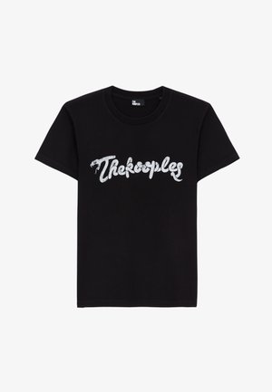 Czarny t-shirt z krótkim rękawem z białym stylizowanym logo tekstowym "The Kooples" na piersi, z okrągłym dekoltem i gładkimi plecami.