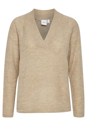 Bežinis megztinis su V formos iškirpte, ilgomis rankovėmis, laisvu siluetu ir minkšta tekstūra. Etiketėse nurodyta prekės ženklas ir medžiagos priežiūros detalės.