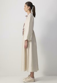 Touché Privé BALLON SLEEVE BOW - Maxi dress - stone