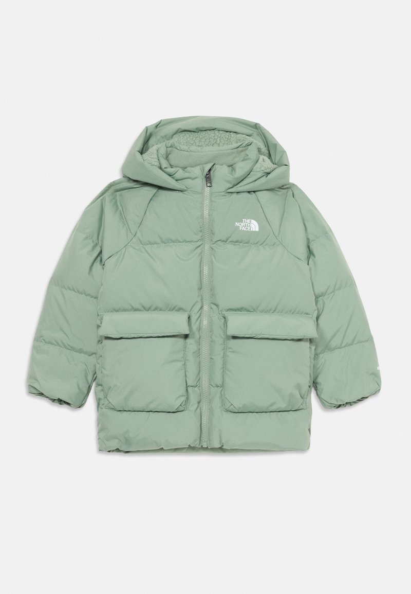 Lys grønn dunjakke med hette, to frontlommer, glidelås og The North Face-logo på brystet. Myk tekstur og quiltet design.