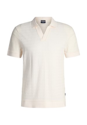 Hellbeige Poloshirt mit strukturiertem Muster, kurzen Ärmeln und V-Ausschnitt. Verfügt über einen kontrastierenden Saum und ein Logotag an der Seite.