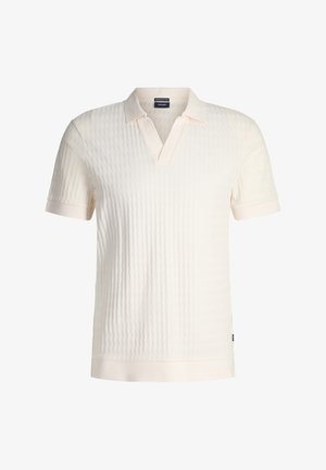 Hellbeige Poloshirt mit strukturiertem Muster, kurzen Ärmeln und V-Ausschnitt. Verfügt über einen kontrastierenden Saum und ein Logotag an der Seite.