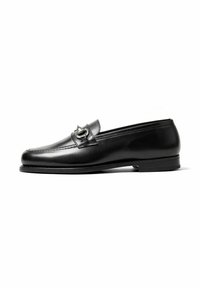 Black leather loafer with a smooth surface, slightly rounded toe, decorative strap, and a low, rectangular heel.