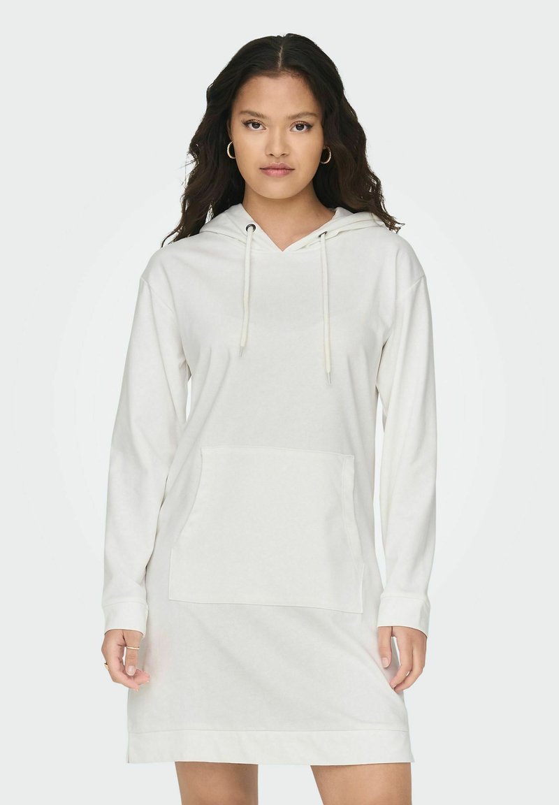 Vit hoodieklänning i mjukt material. Har en framficka, justerbar dragsko på huvan och långa ärmar. Enkelt design och avslappnad passform.