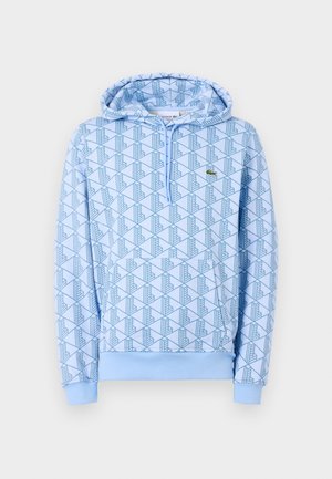 Blauwe hoodie met een geometrisch patroon, voorzak en trekkoordkap. Gemaakt van zachte stof met ribgebreide manchetten en onderrand.