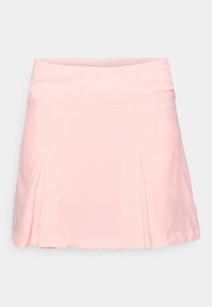 Gonna sportiva di colore rosa chiaro con una texture liscia, una cintura ampia e due pieghe laterali per facilitare i movimenti. Presenta dettagli in rete traspirante.