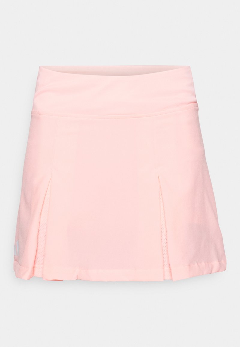 Gonna sportiva di colore rosa chiaro con una texture liscia, una cintura ampia e due pieghe laterali per facilitare i movimenti. Presenta dettagli in rete traspirante.