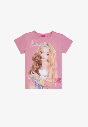 Pinkes Kindershirt mit einer Comic-Mädchen, die einen braunen Welpen hält, Text "So Sweet!" und "TOP Model" auf der Vorderseite.