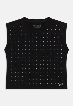 Svart ermeløs topp med rund hals, dekket av jevnt plasserte små sølvstifter, med en liten merkevarelogo ved kanten.