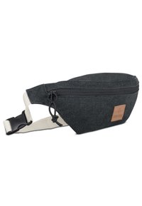 Black denim fanny pack with a smooth texture, zipper closure, and a tan leather logo patch. Adjustable cream strap with buckle.