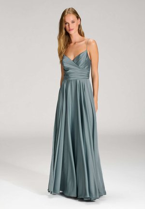 Langes, schieferblaues Abendkleid mit Spaghettiträgern und eingerolltem Oberteil. Weicher, fließender Stoff erzeugt eine drapierten Silhouette bis zum Boden.