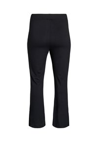 Schwarze Leggings mit mittlerer Taille und ausgestelltem Bein, gefertigt aus elastischem Stoff. Sie zeichnen sich durch eine glatte Textur und ein schlichtes, unverziertes Design aus.