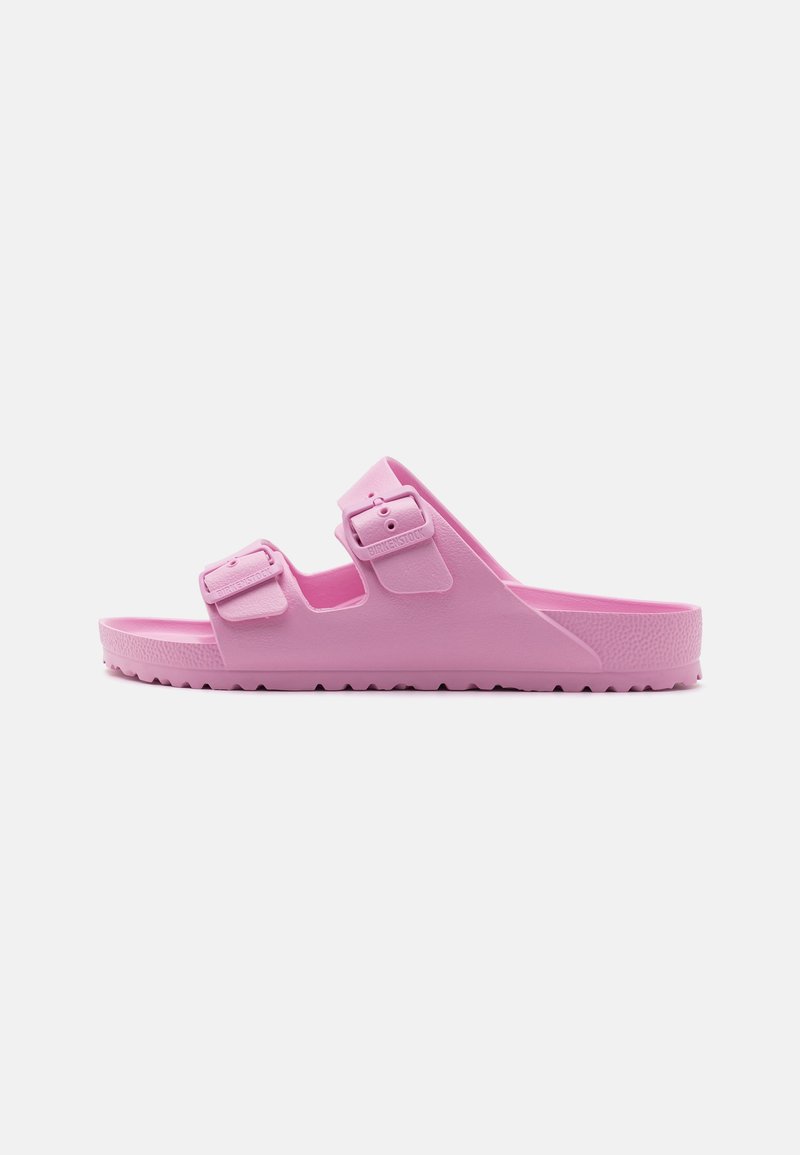 Sandaletti in plastica rosa con due cinturini regolabili, suole testurizzate e un design leggero per comfort e durata.