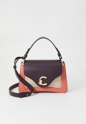 Leather handbag in purple, pink, and beige. Features a structured shape, top handle, detachable strap, and gold-tone hardware.