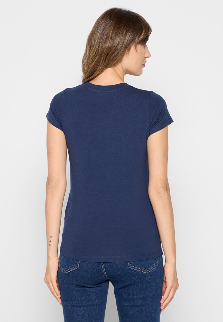 T-shirt a maniche corte blu navy con collo a giro, dal design aderente, realizzato in una miscela di cotone, caratterizzato da una texture liscia e cuciture minime.