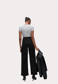Marks & Spencer SEAMLESS WIDE LEG - Džíny Relaxed Fit - black
