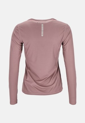Long-sleeve shirt in soft pink fabric, featuring a textured pattern and a round neckline. Label on the back displays "Swedemount."