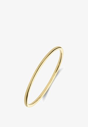 Bague en or avec une finition lisse et polie, de forme circulaire et au design élancé, reflétant la lumière avec un éclat métallique brillant.