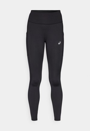 Leggings negre cu talie înaltă, fabricate dintr-un material neted și elastic. Prezintă un logo subtil pe coapsă și buzunare laterale.