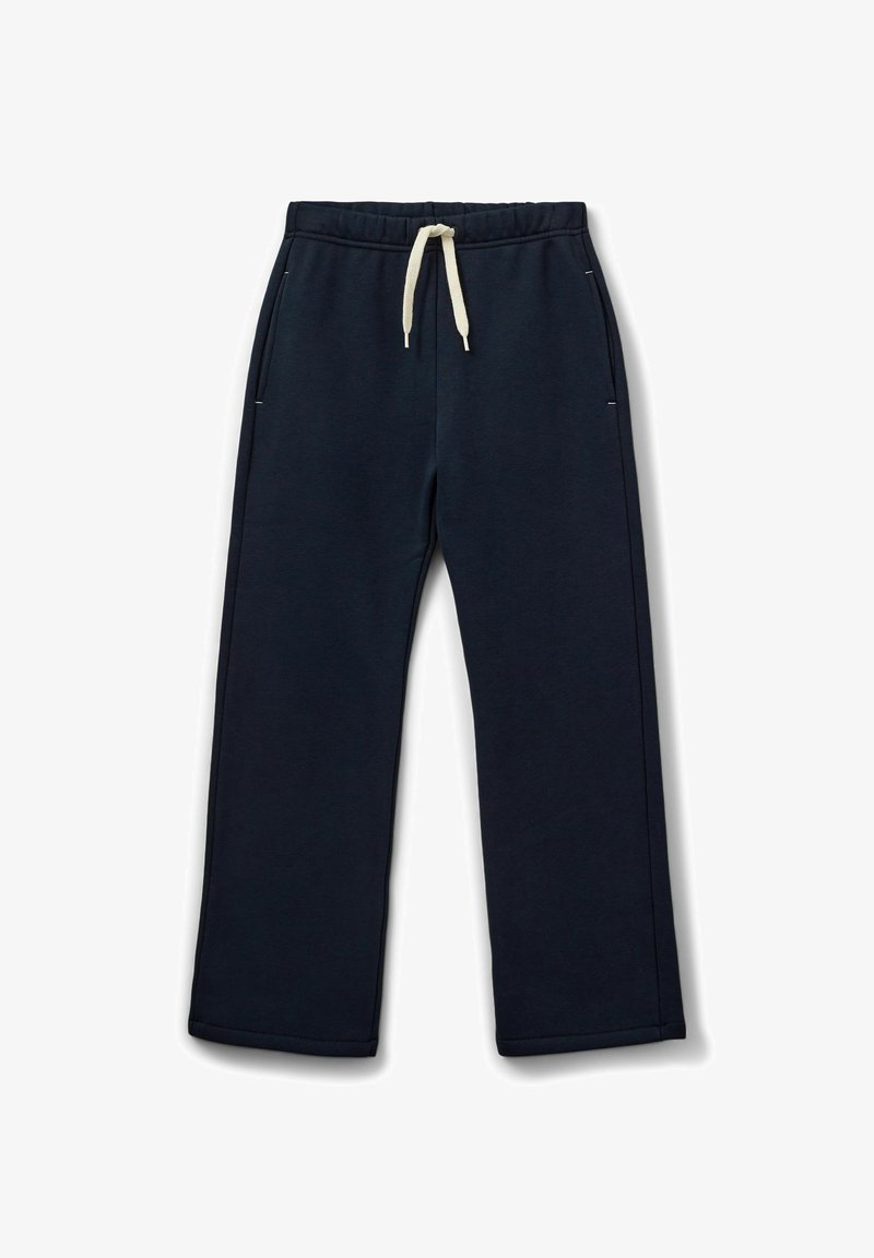 Námornícke modré tepláky s elastickým pásom, bielou šnúrkou a dvoma bočnými vreckami; vyrobené z mäkkej textúrované tkaniny.