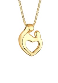 Goldanhänger mit geschwungenem Design und herzförmiger Aussparung. An einer schlichten Goldkette befestigt, glatte Oberfläche mit poliertem Finish.