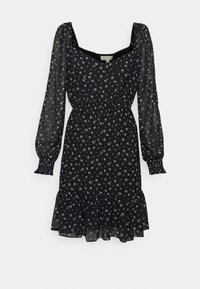 Robe noire avec imprimé floral, décolleté carré, manches longues bouffantes, poignets smockés et ourlet en volants. Fabriquée en tissu léger.