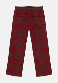 Röda och mörkbruna rutiga pyjamasbyxor med elastisk midjeband och svart "BJÖRN BORG"-logga.