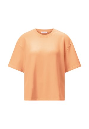 Kratek, ohlapen bombažni T-shirt barve breskve z okroglim izrezom na belem ozadju.