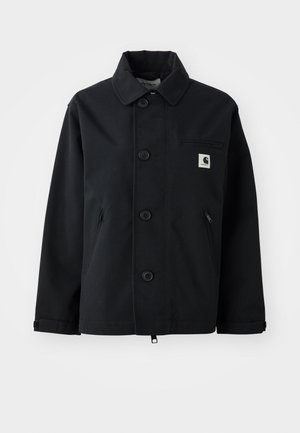 Veste noire en tissu robuste avec une coupe droite, dotée d'une fermeture à boutons, de poches latérales et d'une poche poitrine avec un écusson logo.