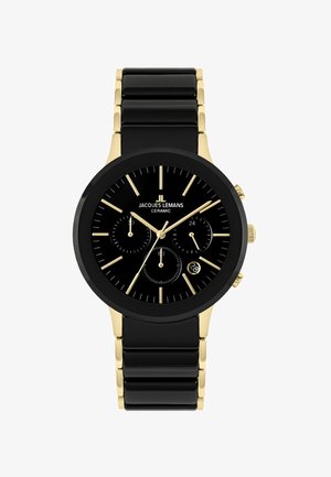 Reloj de cerámica negra con esfera redonda, detalles en dorado, tres subesferas y una ventana para la fecha. Correa sólida negra con eslabones dorados.