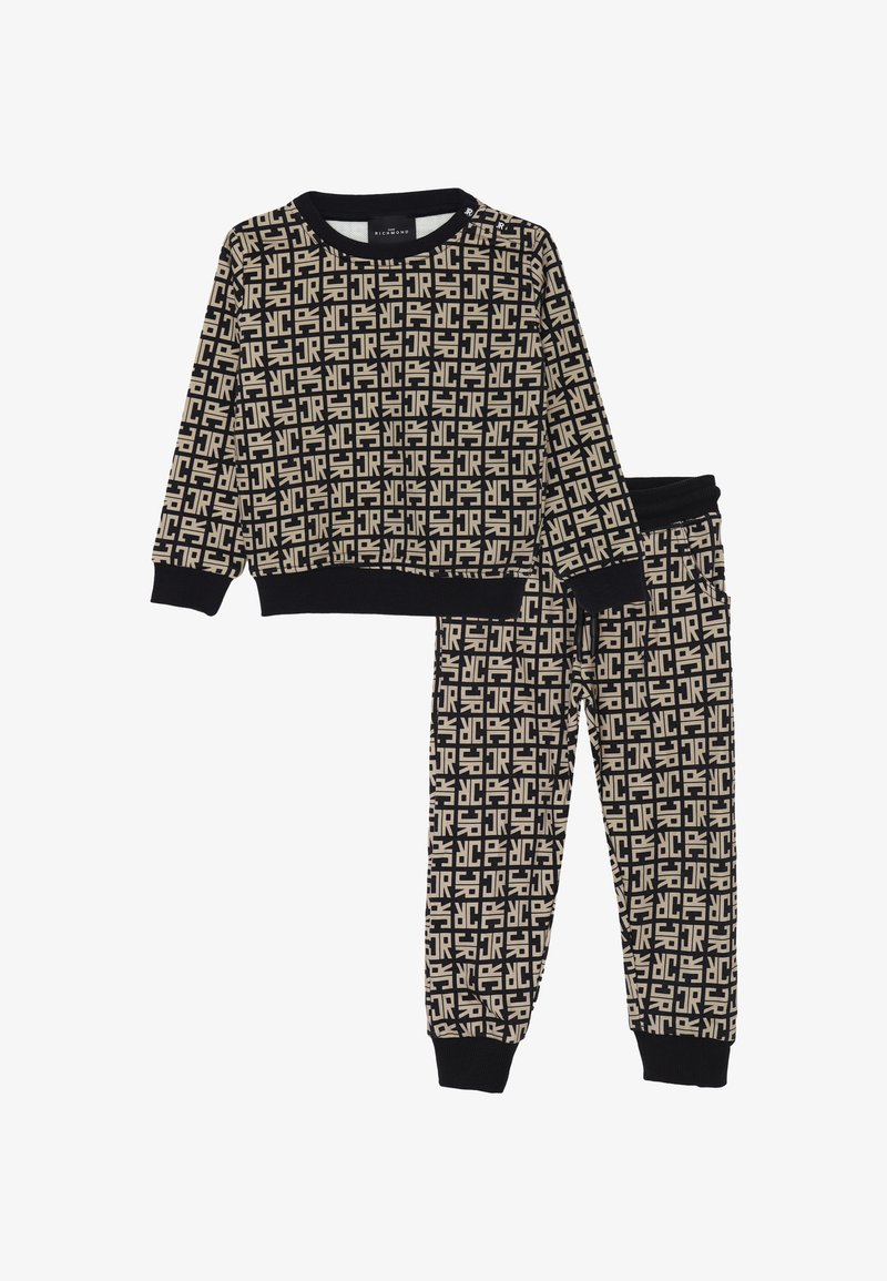 Completo di abbigliamento per il tempo libero in bianco e beige composto da due pezzi, con un motivo geometrico. La felpa ha polsini a coste; i pantaloni hanno una vita elastica e polsini.