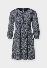 Φόρεμα σε ναυτικό μπλε χρώμα με μικρό λευκό λουλουδάτο σχέδιο, μακριά φουσκωτά μανίκια, στρογγυλή λαιμόκοψη και εφαρμοστή ραφή στη μέση.