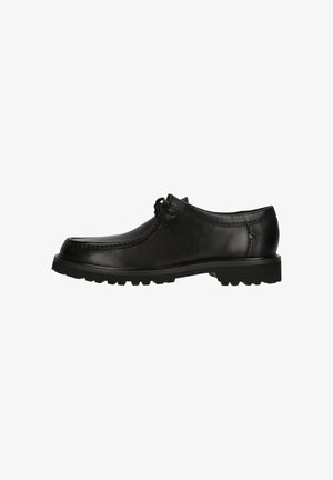 Zwarte lederen schoenen met een ronde neus, veters en een gestructureerde zool met grip. Glad afgewerkte details verbeteren het totale ontwerp.