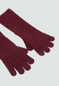 Gants tricotés bordeaux avec un poignet côtelé, dotés d'une texture douce et d'un design à cinq doigts pour la chaleur et le confort.