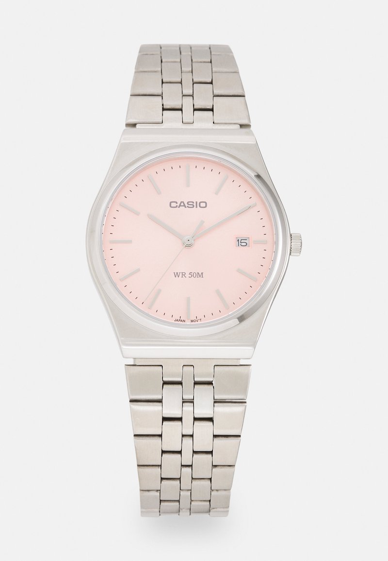 Montre-bracelet en acier inoxydable avec un boîtier rond, un cadran rose clair, des index horaires argentés et un affichage de la date à 3 heures. Étanche jusqu'à 50 mètres.